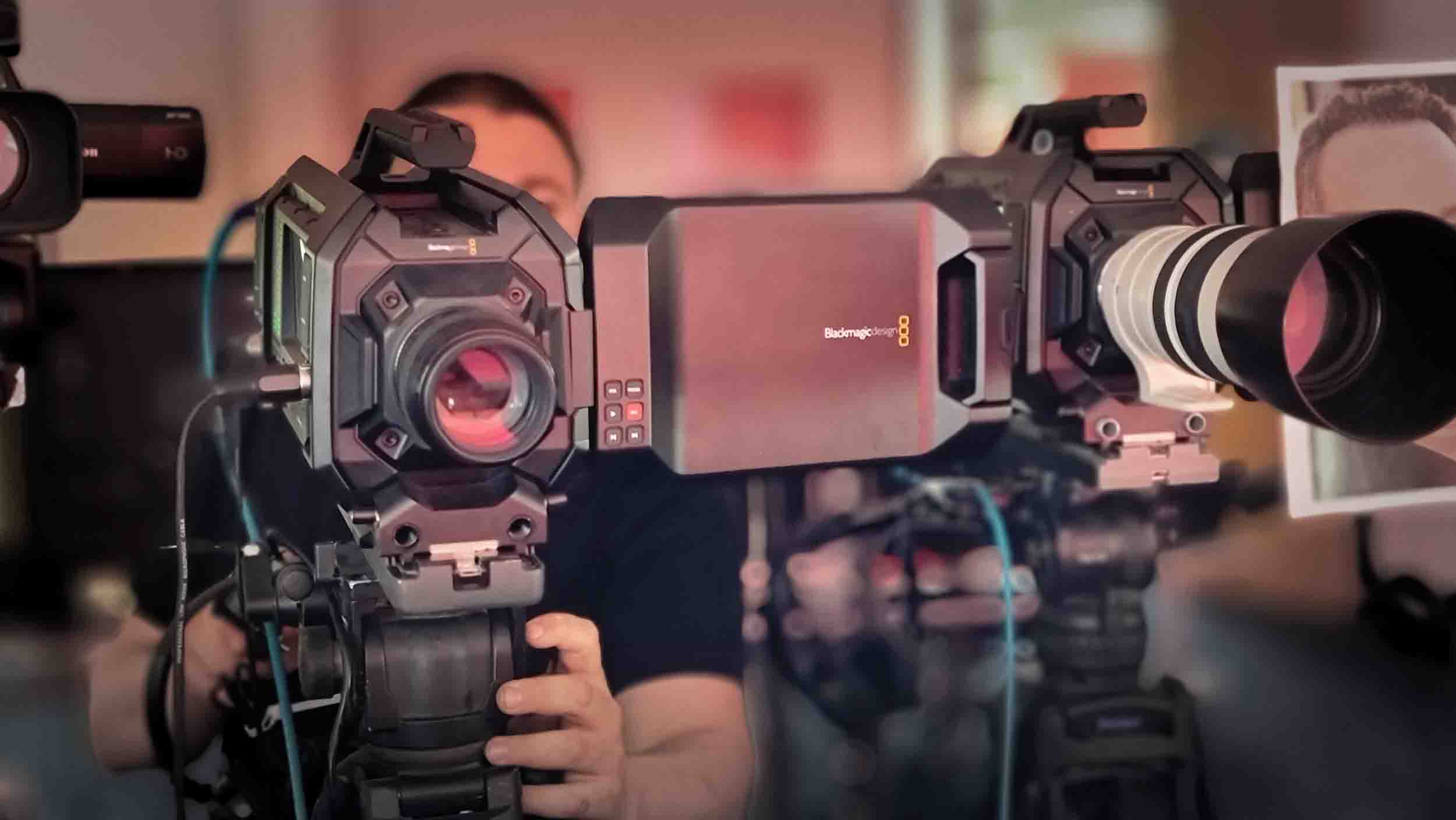 A photograph of professional video production cameras.