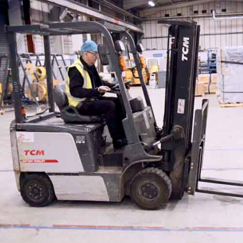 A photograph of a forklift training video made by Concept Media Group.